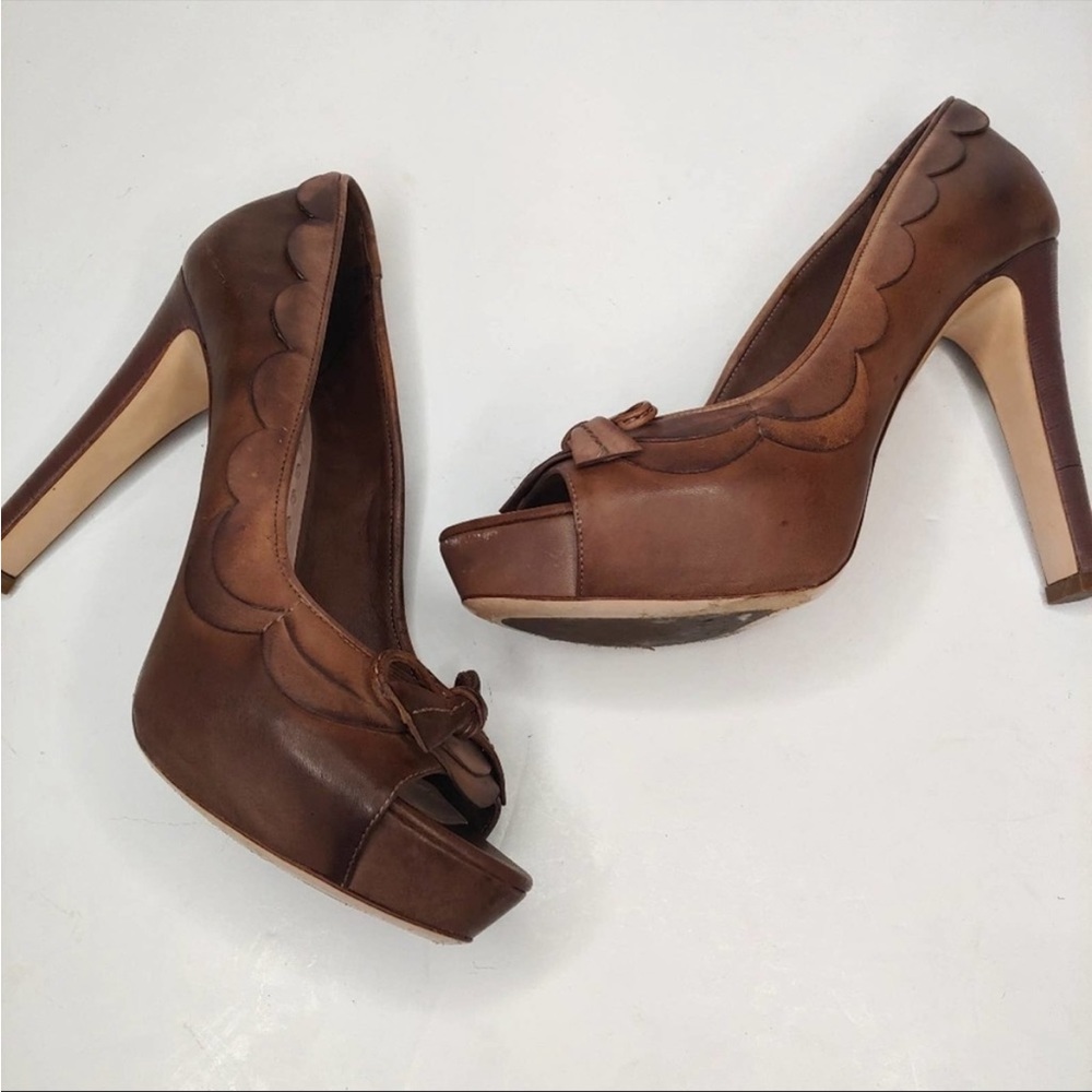 Miu Miu Washed Leather Pumps with Scalloped Accent